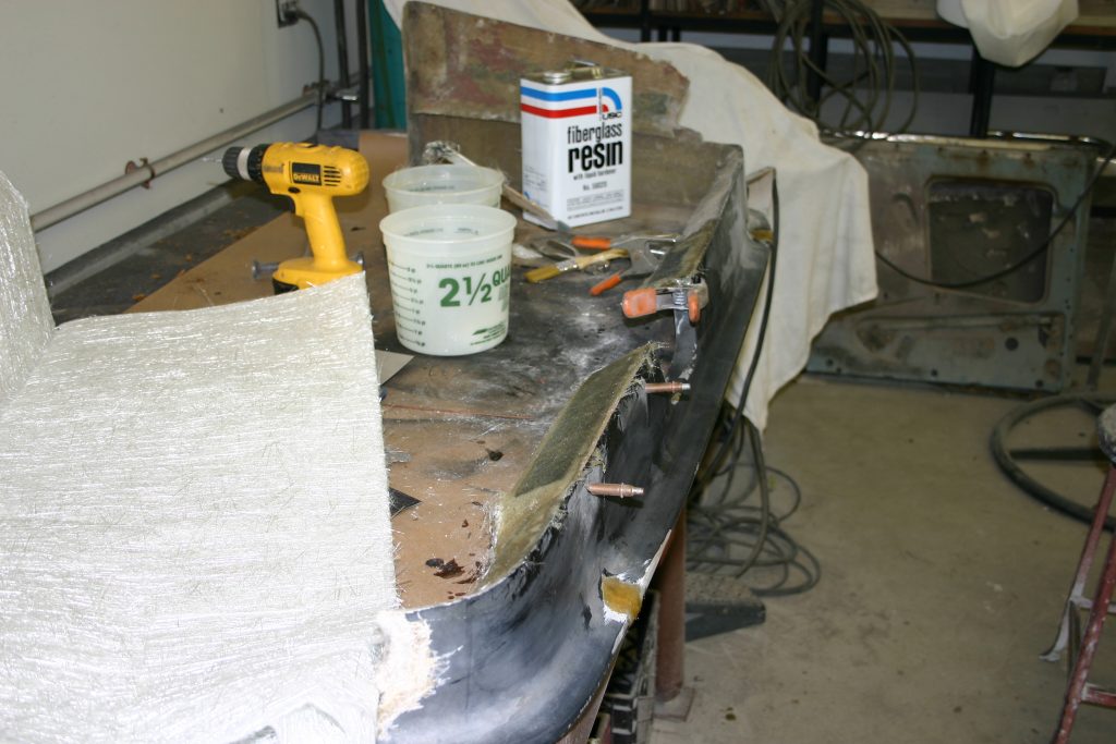 Image of fiberglass work being done to rear valance.