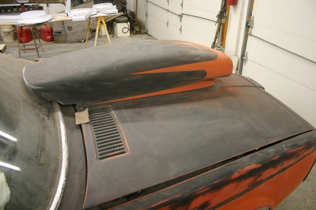 Image of hood scoop during sanding. 